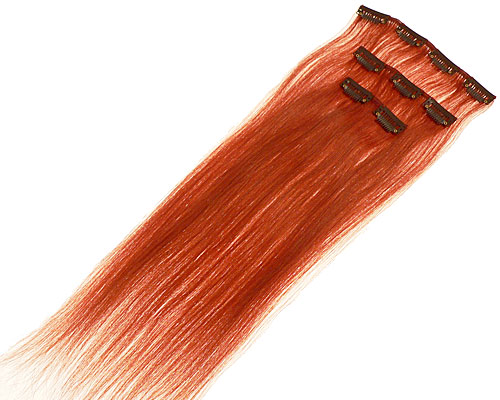 Se mere om 40 cm langt clip on hår i et sæt med 3 baner i gyldenorange farve i web-butikken