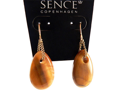 Se mere om brune øreringe fra sence copenhagen i web-butikken
