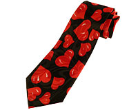 Se mere om Slips i sort farve med festlige røde hjerter i web-butikken