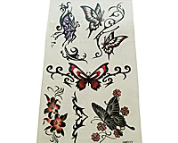 Se mere om Tattoo med flotte sommerfugle i røde lilla og mørke farver i web-butikken